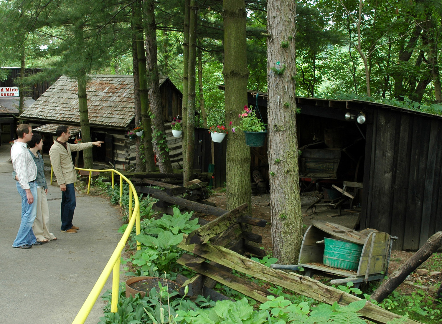 Wagon barn at Tour-Ed Mine — horse-drawn farm wagon and sleigh